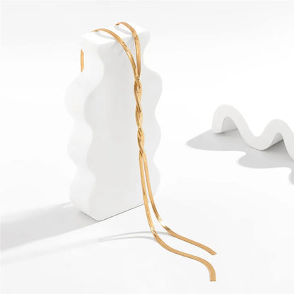 Flaira – Collana regolabile dorata con design serpente