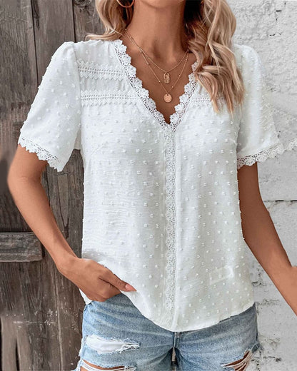 ZOE | Blusa in pizzo di maniche corte con scollo a V