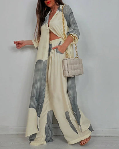 AMARA – SET DUE PEZZI CON DRAPPEGGIATO ELEGANTE