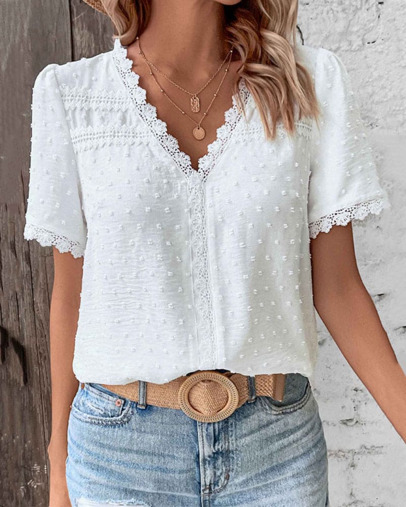 ZOE | Blusa in pizzo di maniche corte con scollo a V