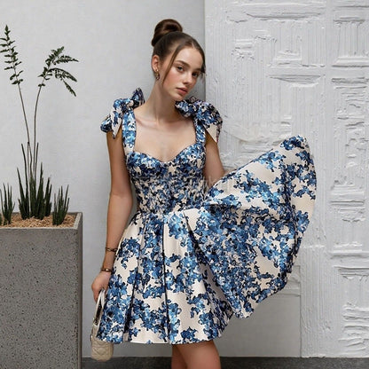 NAYELI – ABITO DI SPALLE CON FIOCCO E STAMPA FLOREALE EDEN