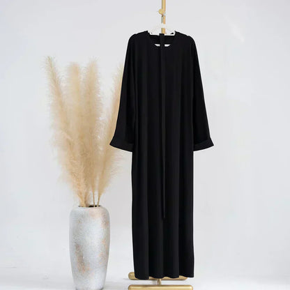 Ariane - Abaya Elegante di Maglia con Cintura e Tasche Laterales