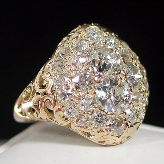 Anello vintage dorato con diamanti rotondi