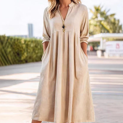 Abito midi Fluido con Vita Imperio e scollo a V – Eleganza Raffinata