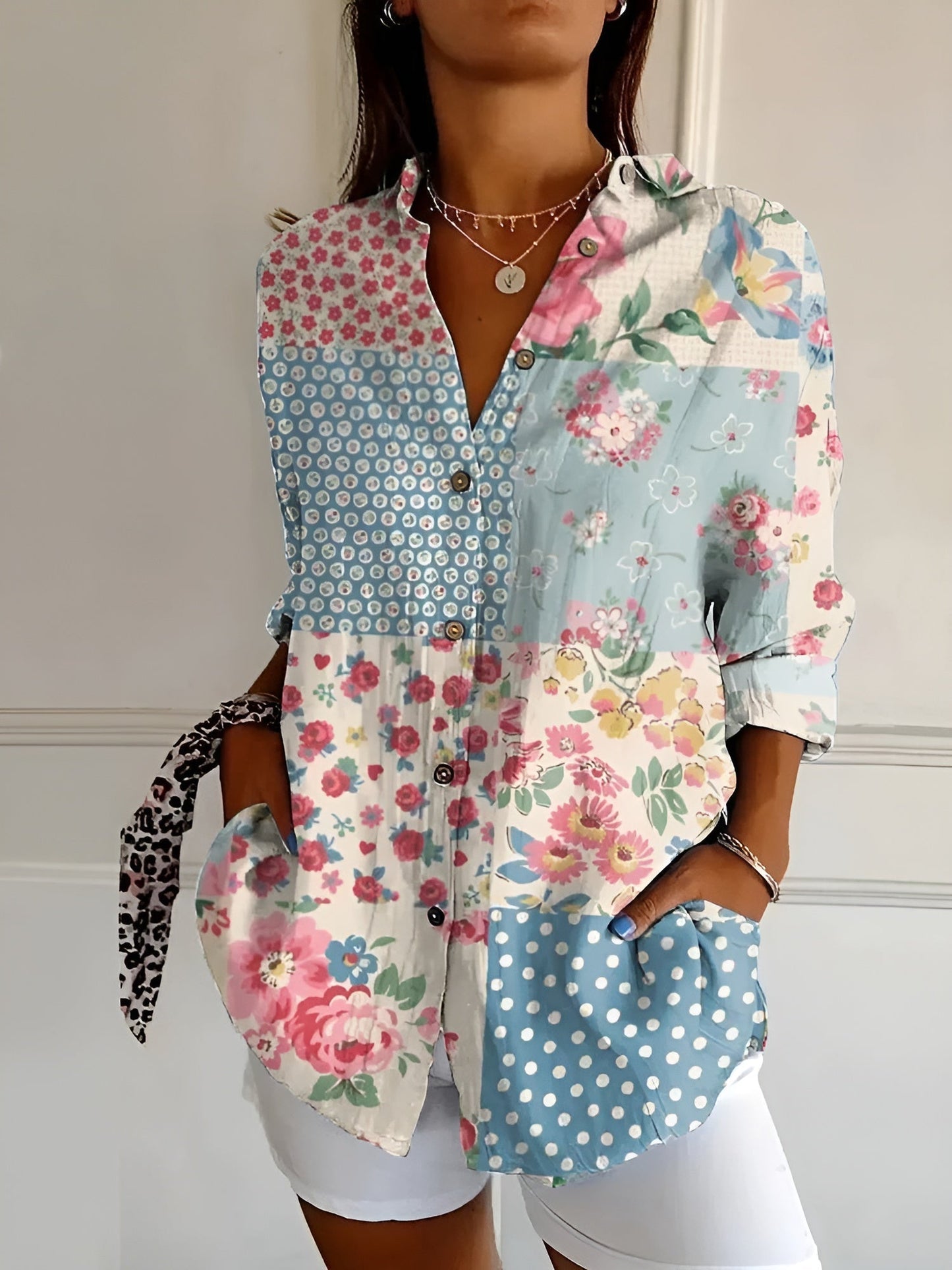 BLUSA FLOREALE DESIREE CON TAPETA DI BOTTONI