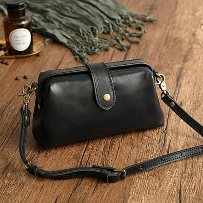 Herdis | Borsa Classica e compatta in calda tonalità cognac